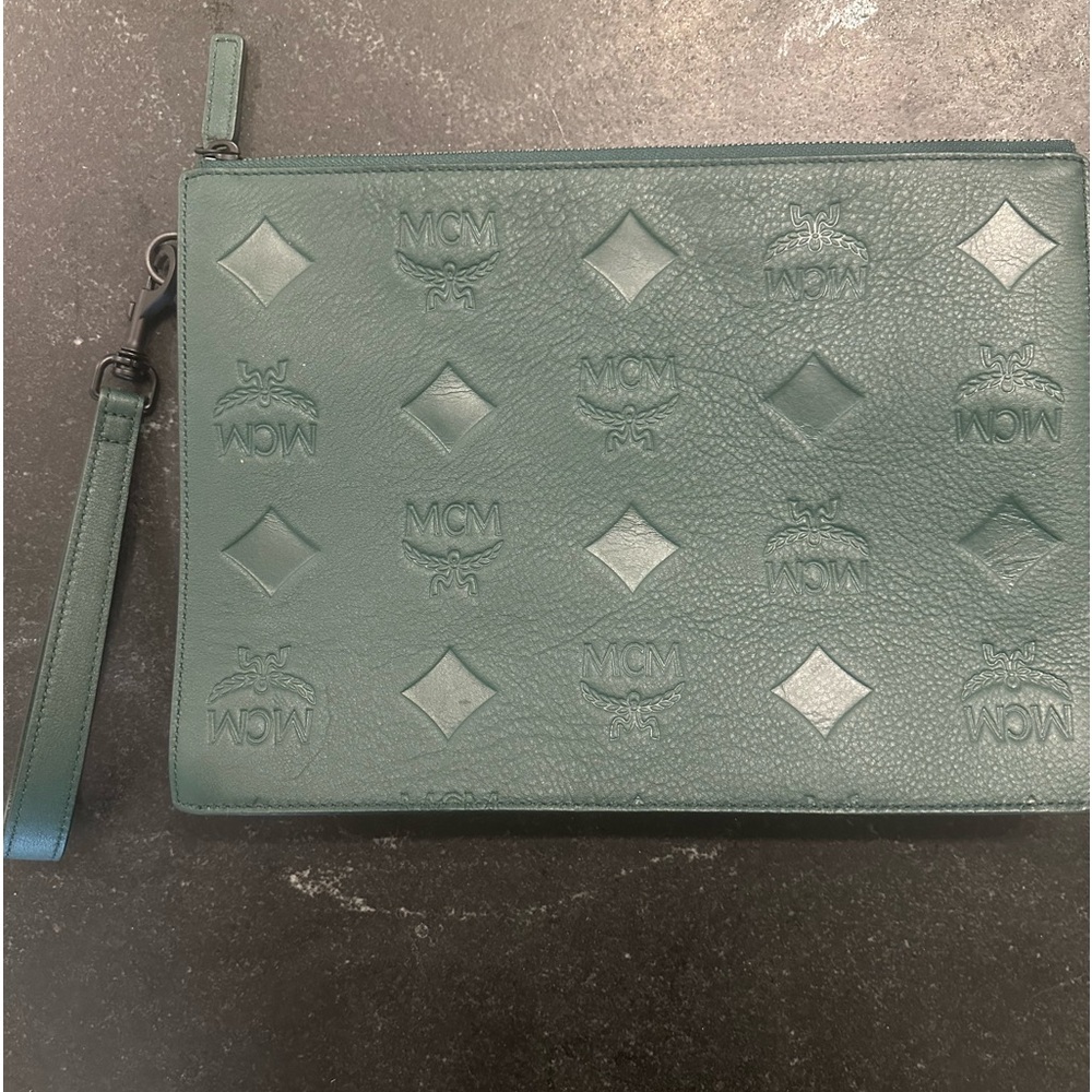 Mcm maxi logo leather pouch